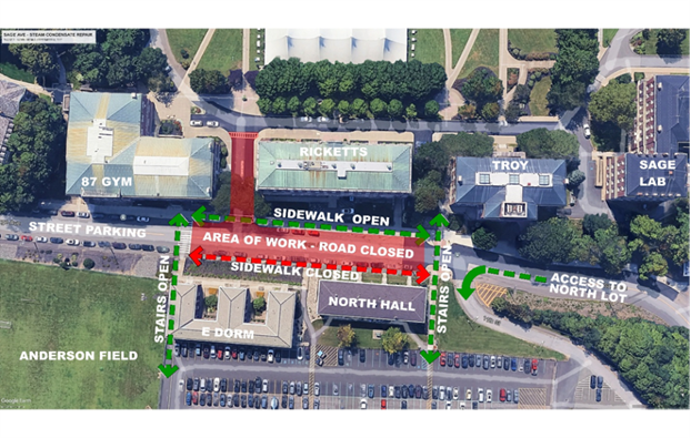 Aerial view of a campus map highlighting construction zones with labeled areas and pathways, including "Area of Work: Road Closed," and "Sidewalk Open/Closed" signs around buildings named Ricketts, Troy, Sage Lab, and others, with visible surrounding streets and green spaces.